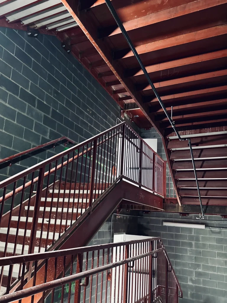 Steel Stair Fabrication for Multi-Story Buildings: Prefabrication vs. Field Assembly Steel Stair Fabrication for Multi-Story Buildings: Prefabrication vs. Field Assembly
